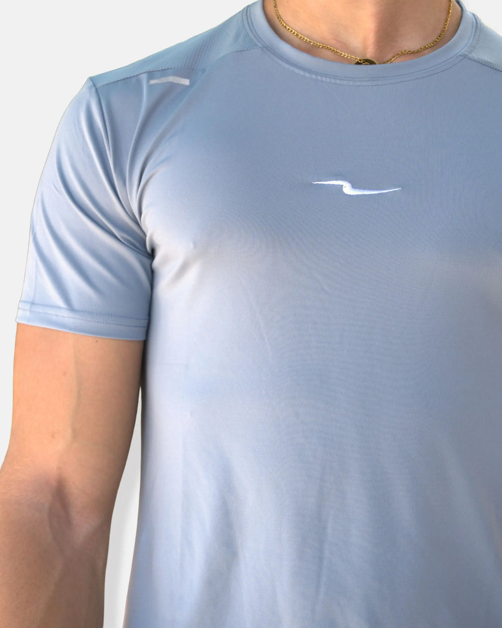 T-shirt running bleu ciel avec dos perforé et bande réfléchissante
