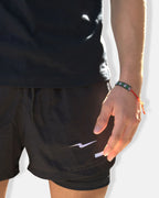 Short de sport 2 en 1 homme noir, logo éclair brodé Inazuma Originals